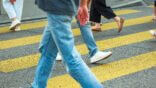 Unrecognizable,Legs,Of,People,Crossing,A,Yellow,Zebra,Or,Urban