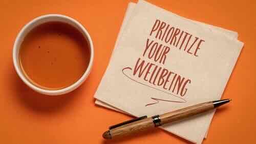 prioritize your wellbeing, inspirational note on a napkin, self care concept